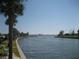 Calm waterway with palm trees and distant buildings at 4902 31St S Ave # 109, Gulfport, FL 33707