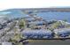 Aerial view of waterfront community with lush landscaping and boat slips at 5176 Se Salmon Se Dr # D, St Petersburg, FL 33705