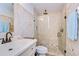 Updated bathroom with a walk-in shower and stone tile at 5176 Se Salmon Se Dr # D, St Petersburg, FL 33705