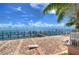Relaxing bayside patio with cornhole and seating at 5176 Se Salmon Se Dr # D, St Petersburg, FL 33705