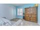 Cozy bedroom with ample closet space and wood furniture at 5176 Se Salmon Se Dr # D, St Petersburg, FL 33705