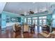 Community clubhouse with seating and hardwood floors at 5176 Se Salmon Se Dr # D, St Petersburg, FL 33705