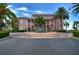 Two-story community clubhouse with circular drive at 5176 Se Salmon Se Dr # D, St Petersburg, FL 33705