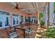Relaxing community patio with seating and ceiling fans at 5176 Se Salmon Se Dr # D, St Petersburg, FL 33705