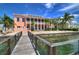 Wooden community dock extending to the water at 5176 Se Salmon Se Dr # D, St Petersburg, FL 33705