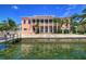 Waterfront home with a large balcony, dock, and patio at 5176 Se Salmon Se Dr # D, St Petersburg, FL 33705