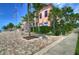 Side view of waterfront home with lush landscaping at 5176 Se Salmon Se Dr # D, St Petersburg, FL 33705
