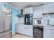 Modern kitchen with stainless steel appliances and granite countertops at 5176 Se Salmon Se Dr # D, St Petersburg, FL 33705