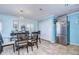 Modern kitchen with stainless steel appliances and gray cabinets at 5176 Se Salmon Se Dr # D, St Petersburg, FL 33705