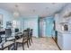 Modern kitchen with gray cabinets and stainless steel appliances at 5176 Se Salmon Se Dr # D, St Petersburg, FL 33705