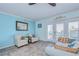Living room with seating area and access to balcony at 5176 Se Salmon Se Dr # D, St Petersburg, FL 33705