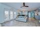 Light and airy living room with light blue walls and comfy seating at 5176 Se Salmon Se Dr # D, St Petersburg, FL 33705