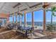 Covered patio overlooking the water with seating at 5176 Se Salmon Se Dr # D, St Petersburg, FL 33705