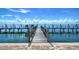 Tranquil waterfront dock with seating area at 5176 Se Salmon Se Dr # D, St Petersburg, FL 33705