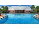 Enjoy this sparkling, resort-style pool with plenty of space for relaxation at 5176 Se Salmon Se Dr # D, St Petersburg, FL 33705