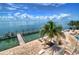 Enjoy stunning water views from this expansive deck, complete with a dock and seating area at 5176 Se Salmon Se Dr # D, St Petersburg, FL 33705