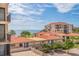 Aerial view of waterfront community with pool and lush landscaping at 6104 Palma Del Mar S Blvd # 404, St Petersburg, FL 33715