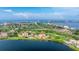 Wide aerial view of condo community near the water at 6104 Palma Del Mar S Blvd # 404, St Petersburg, FL 33715
