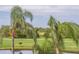 Partial view of the golf course and landscaping at 6104 Palma Del Mar S Blvd # 404, St Petersburg, FL 33715