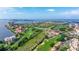 Aerial view of waterfront property and surrounding area at 6104 Palma Del Mar S Blvd # 404, St Petersburg, FL 33715