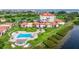 Aerial view showing condo, pool, and water access at 6104 Palma Del Mar S Blvd # 404, St Petersburg, FL 33715