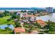 Aerial view highlighting condo location by golf course and water at 6104 Palma Del Mar S Blvd # 404, St Petersburg, FL 33715