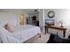 Comfortable bedroom with a queen-size bed and ensuite access at 6104 Palma Del Mar S Blvd # 404, St Petersburg, FL 33715