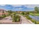 Community features a parking lot, lush landscaping, and a tranquil pond at 6104 Palma Del Mar S Blvd # 404, St Petersburg, FL 33715