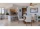 Condo kitchen with granite countertop, stainless steel appliances, and breakfast bar at 6104 Palma Del Mar S Blvd # 404, St Petersburg, FL 33715