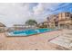 Inviting heated pool with plenty of lounge chairs at 6104 Palma Del Mar S Blvd # 404, St Petersburg, FL 33715