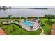 Relaxing waterfront pool area with ample lounge chairs at 6104 Palma Del Mar S Blvd # 404, St Petersburg, FL 33715