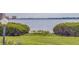 Scenic waterfront property with lush green landscaping at 6104 Palma Del Mar S Blvd # 404, St Petersburg, FL 33715