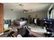 Bedroom with large bed and home office at 6947 Bottle Brush Dr, Port Richey, FL 34668