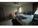 Main bedroom with a bed and window at 6947 Bottle Brush Dr, Port Richey, FL 34668