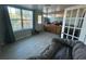 Bonus room with windows, cabinets and flooring at 6947 Bottle Brush Dr, Port Richey, FL 34668