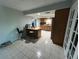 Kitchen with island and wooden cabinets at 6947 Bottle Brush Dr, Port Richey, FL 34668