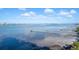 Aerial view of waterfront homes with private docks and beautiful water views at 920 N Osceola Ave # 702, Clearwater, FL 33755