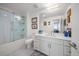 Modern bathroom with walk-in shower and white cabinets at 920 N Osceola Ave # 702, Clearwater, FL 33755