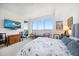 Spacious bedroom with large windows offering stunning water views at 920 N Osceola Ave # 702, Clearwater, FL 33755