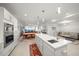 Open concept kitchen with island, stainless steel appliances, and water views at 920 N Osceola Ave # 702, Clearwater, FL 33755