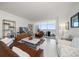 Spacious living room with water views and comfortable seating at 920 N Osceola Ave # 702, Clearwater, FL 33755