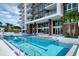 Resort-style pool with spa and comfortable lounge chairs at 920 N Osceola Ave # 702, Clearwater, FL 33755