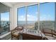 Relaxing sitting area with wicker chairs and water views at 920 N Osceola Ave # 702, Clearwater, FL 33755