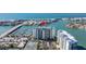 Aerial view of building and marina at 9525 Blind Pass Rd # 507, St Pete Beach, FL 33706