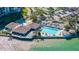 Aerial view of community pool and clubhouse at 9525 Blind Pass Rd # 507, St Pete Beach, FL 33706