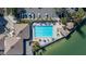 Aerial view of community pool and marina at 9525 Blind Pass Rd # 507, St Pete Beach, FL 33706