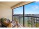 Relaxing balcony overlooking marina and city views at 9525 Blind Pass Rd # 507, St Pete Beach, FL 33706