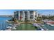 Waterfront building exterior with boat slips at 9525 Blind Pass Rd # 507, St Pete Beach, FL 33706