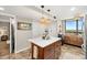 Modern kitchen with island and water views at 9525 Blind Pass Rd # 507, St Pete Beach, FL 33706