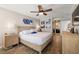 Bright main bedroom with ensuite bathroom and hardwood floors at 9525 Blind Pass Rd # 507, St Pete Beach, FL 33706